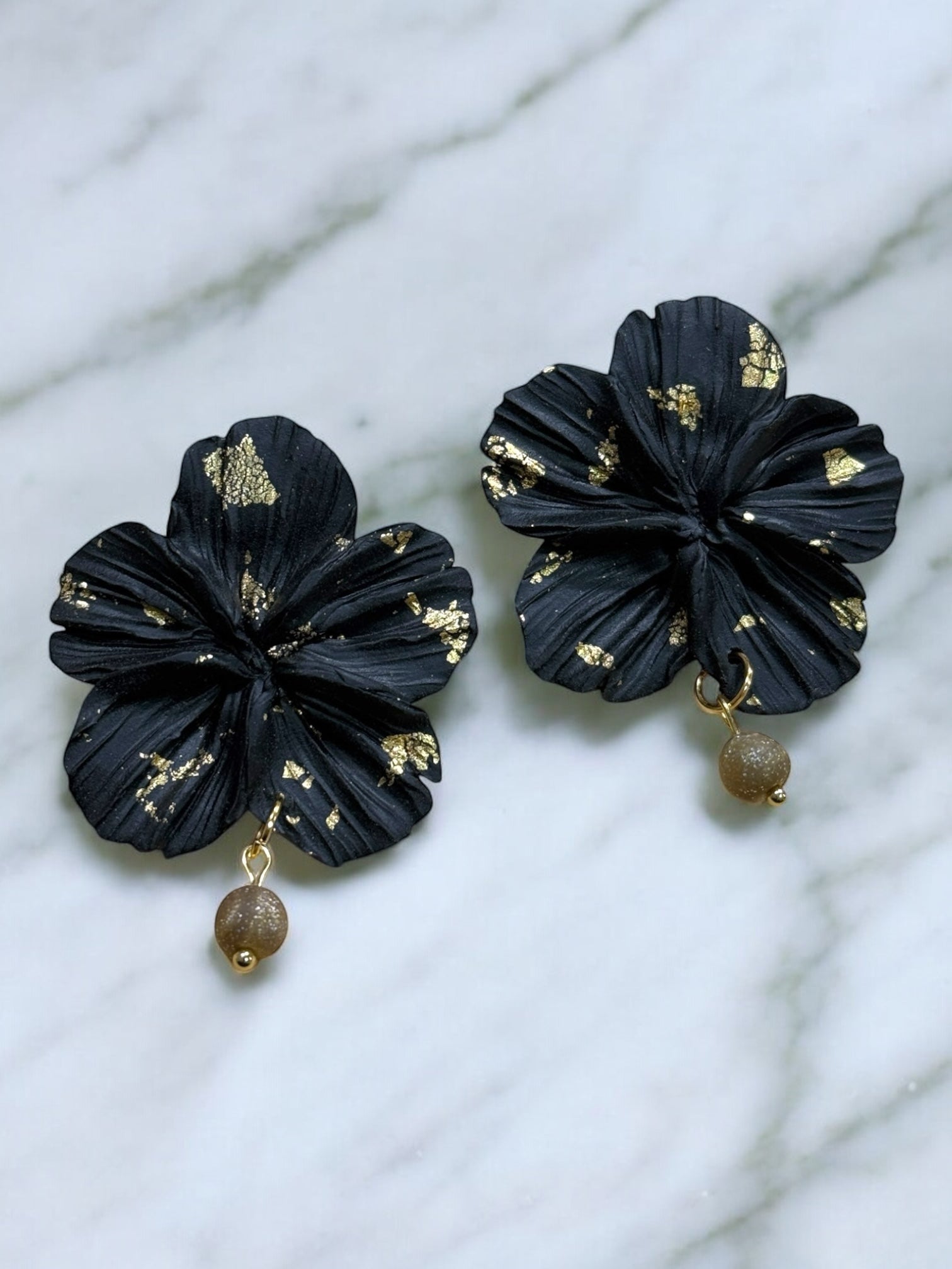 Clari | Black Golden